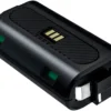 051229d0-899b-4160-a4d2-0cb295fd24ea Dual-slot battery charger with two green battery slots and gold contact pins.