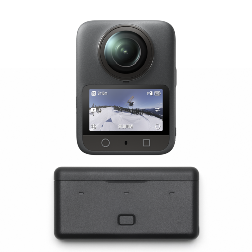 Compact action camera with a wide lens and built‑in small LCD screen, shown above a removable battery pack on a white background.