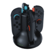 nintendo-switch-el-salvador-next-charging-dock-joycon Charging dock for two wireless game controllers with status LEDs showing charging in progress