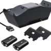 80235f71-711a-4ad8-a701-f01c63519df2 Black multi-bay rechargeable battery charger with two removable battery packs, USB connector, and two battery holders shown.