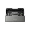 Open DJI carry case interior with two branded controllers visible inside foam compartments