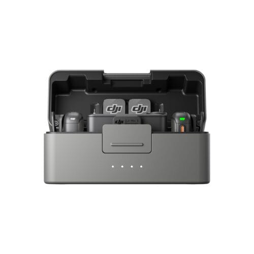 Open DJI carry case interior with two branded controllers visible inside foam compartments