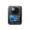 Close-up of a black dash cam with a large circular lens and a small display below showing a landscape scene.