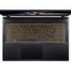 descarga (15) Top-down view of a dark laptop open with an orange-backlit keyboard and centered touchpad