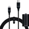 e8bd3c71-6c7f-40b3-bc9f-06db0628ff82 Coiled black USB charging cable with USB-C and USB-A connectors and a compact power bank beside it.