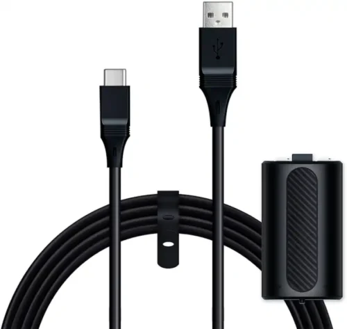 e8bd3c71-6c7f-40b3-bc9f-06db0628ff82 Coiled black USB charging cable with USB-C and USB-A connectors and a compact power bank beside it.