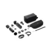 dji-el-salvador-osmo-pocket-4-creator-combo.jpg@ultra Osmo action camera accessory kit laid out: mounts, adapters, batteries, cables, with two black pouches.